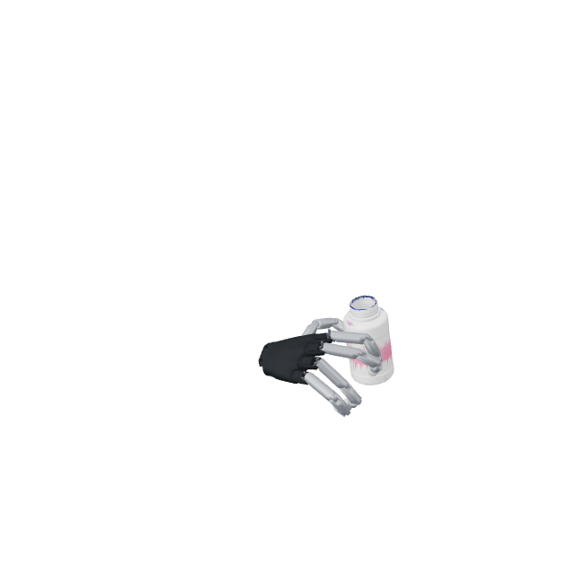 The hand moves a red striped bottle to a new position.